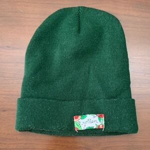 Stay Home Club forest green beanie with “rotten” patch